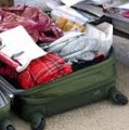 packed bags over packed bags